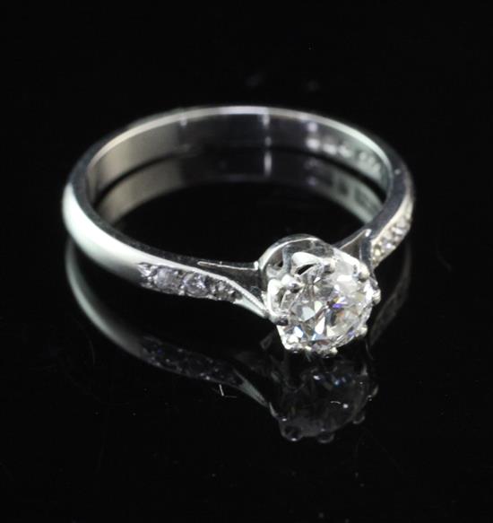 A platinum and single stone diamond ring, size L.